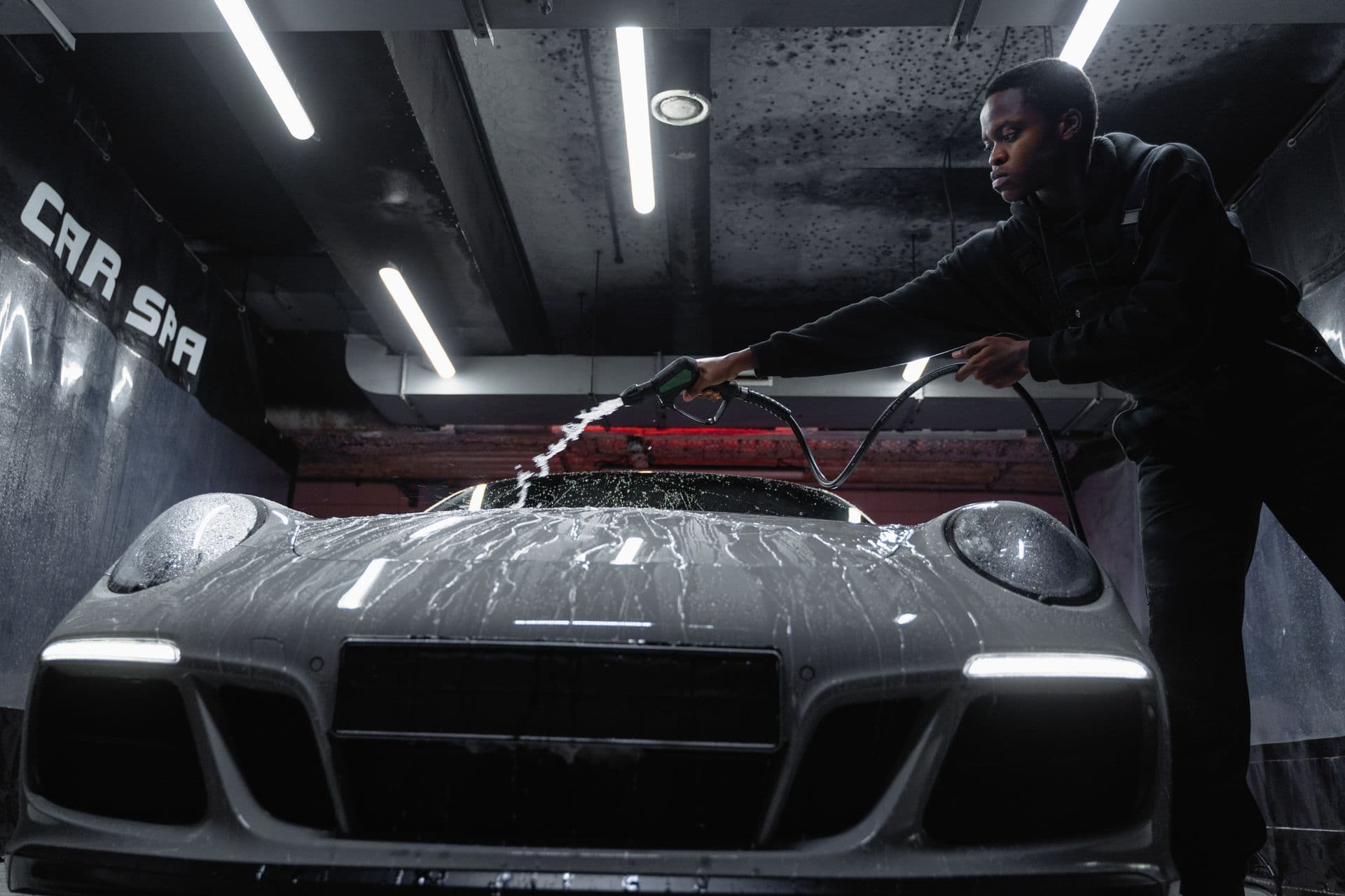 Modern car detailing — polished finish on a luxury car