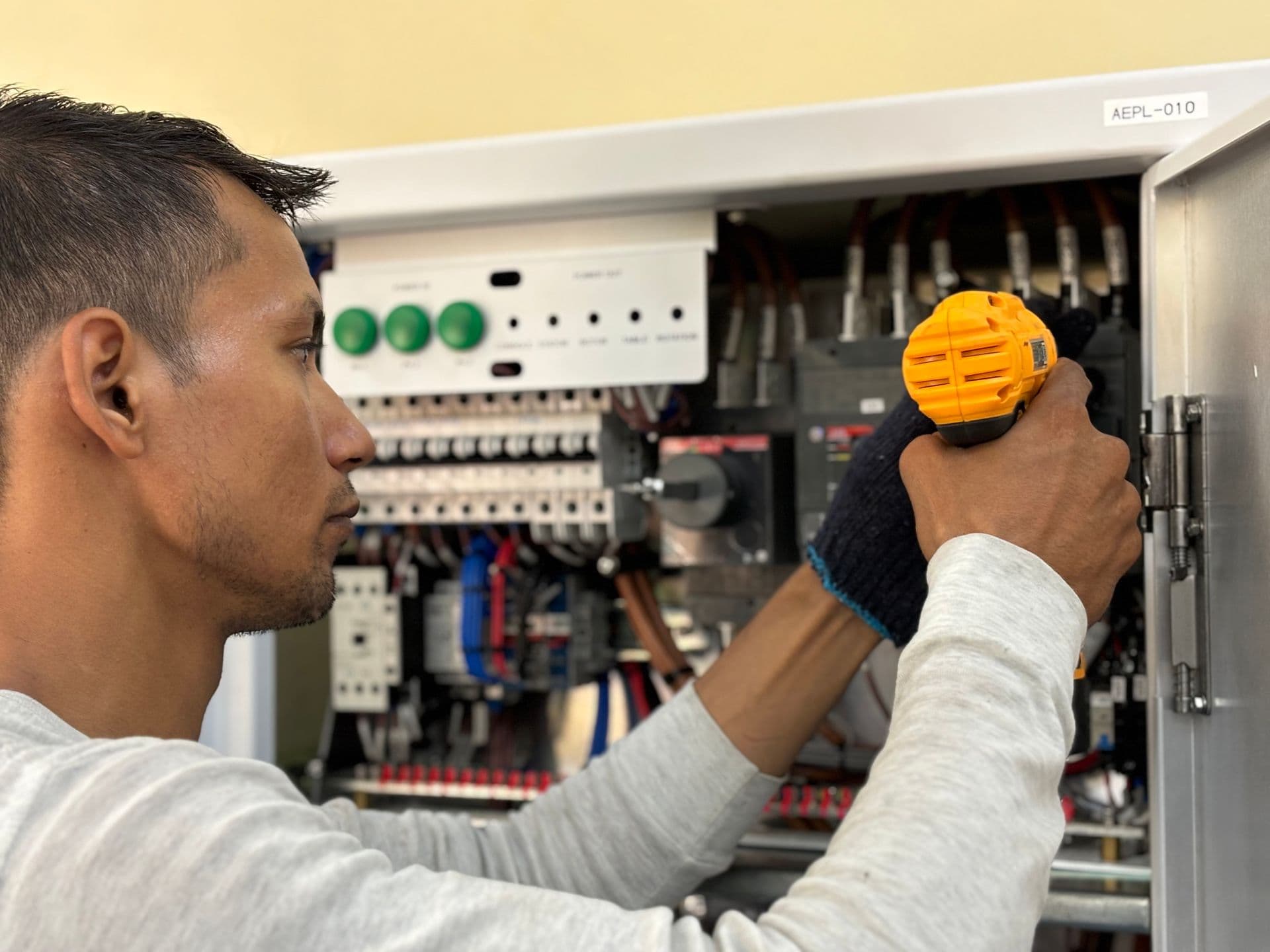 Modern electrician working — fuse-board / installation