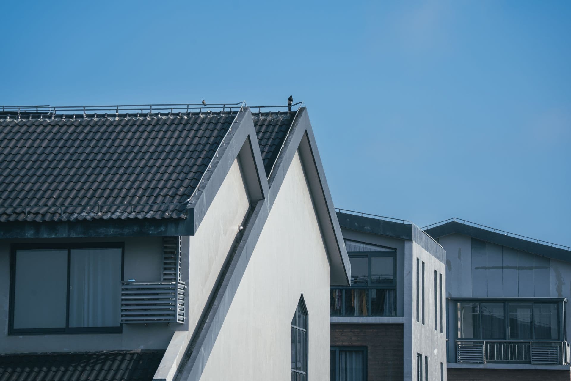 Modern UK pitched roof — fresh tiles and clean lines